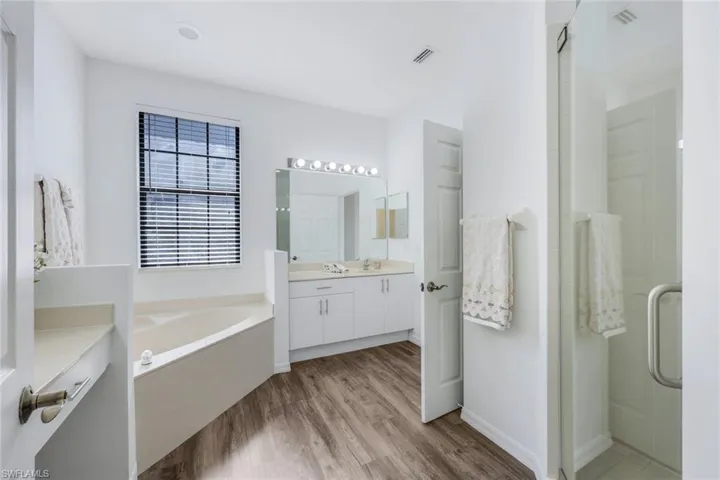 Guest bath upstairs has both a tub and a s