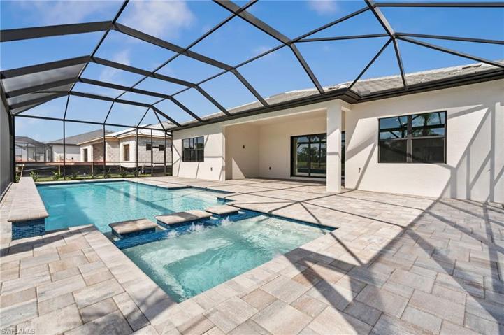 Custom pool and spa with water feature