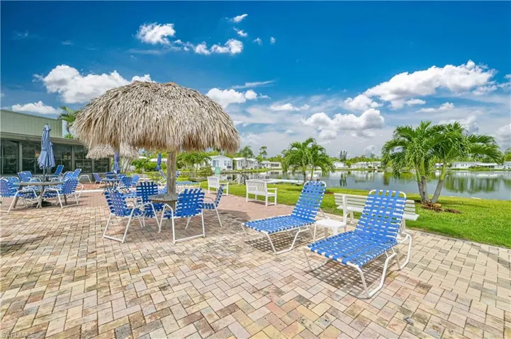 View of patio / terrace featuring a water view
