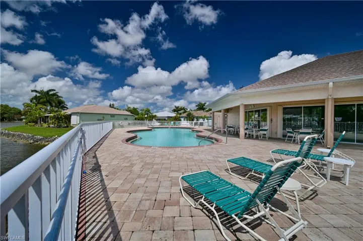 View of swimming pool with a patio