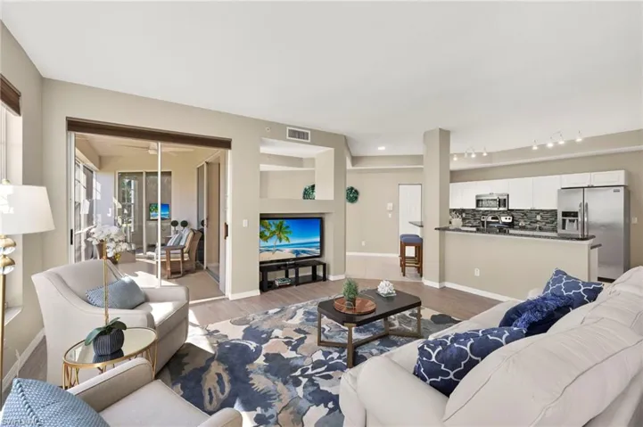 Living room featuring light wood finished floors and baseboards