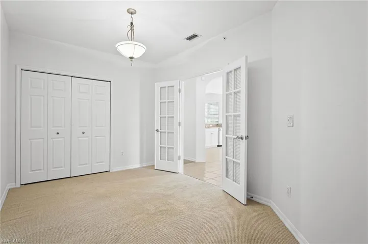 3rd bedroom has french doors.