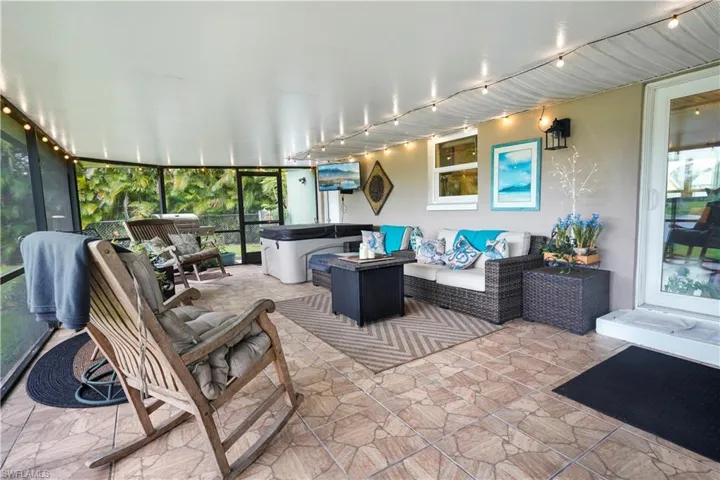 You'll love spending time in your huge screen porch over looking the lake. The back yard faces north and has lots of shade trees so it will stay much cooler!