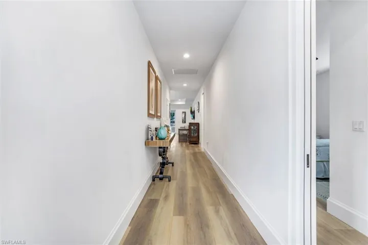 Foyer with light hardwood / wood-style flooring