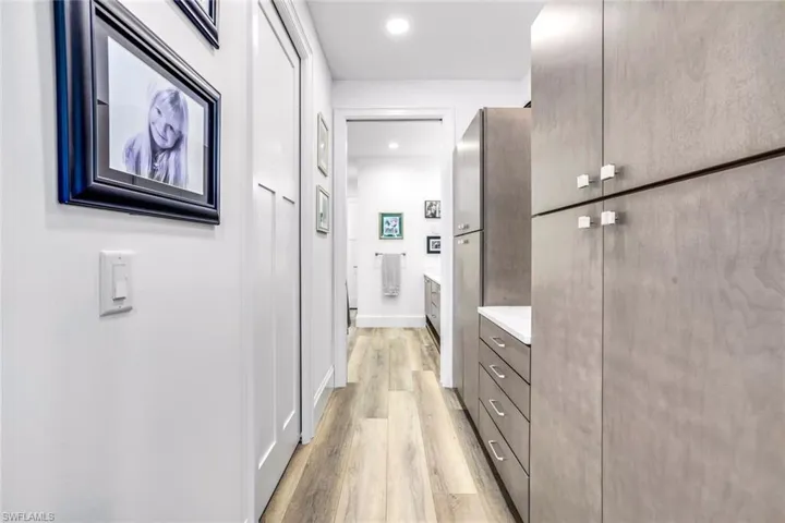 Corridor featuring light hardwood / wood-style flooring