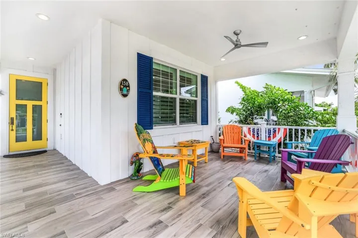 Expansive front Deck featuring ceiling fan