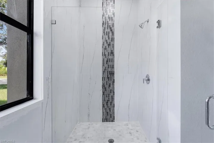 Bathroom with an enclosed shower