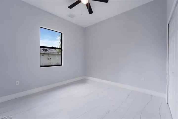 Spare room featuring ceiling fan