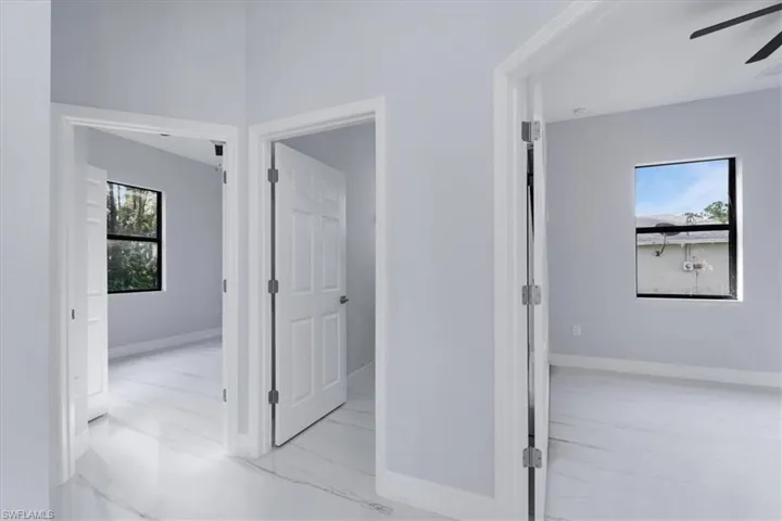 Hallway featuring a healthy amount of sunlight
