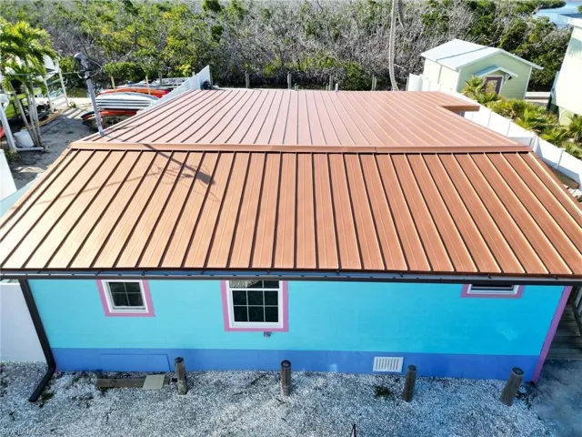 View of property exterior. Outstanding Metal roof