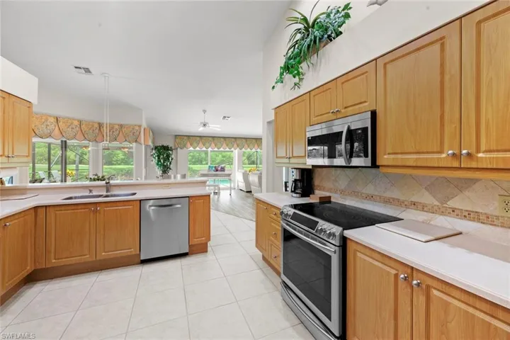 Large open kitchen overlooking great room