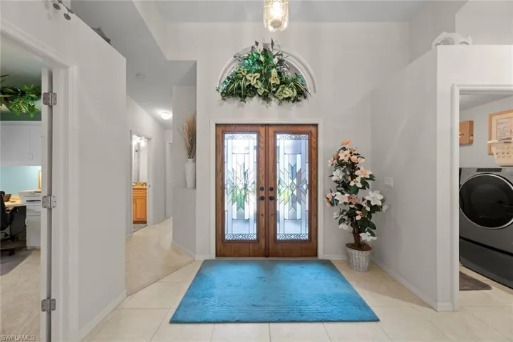 Stunning, contemporary impact glass entry doors