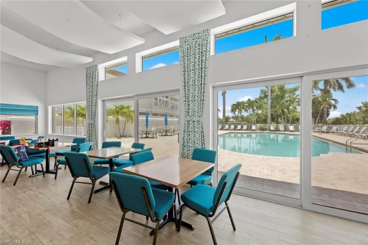 Airy clubhouse with view to the community pool