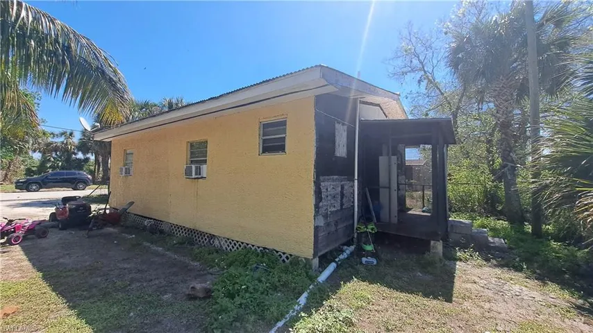 View of property exterior featuring stucco siding
