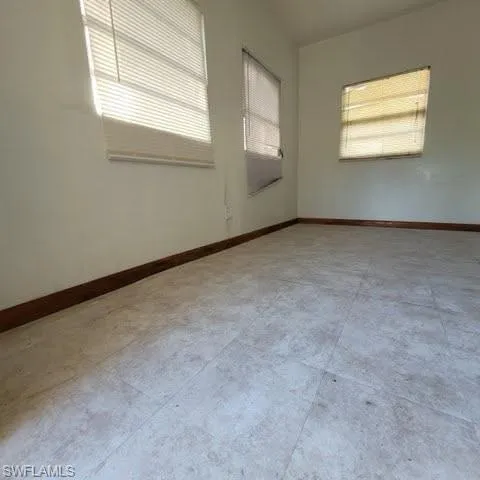 Spare room with baseboards