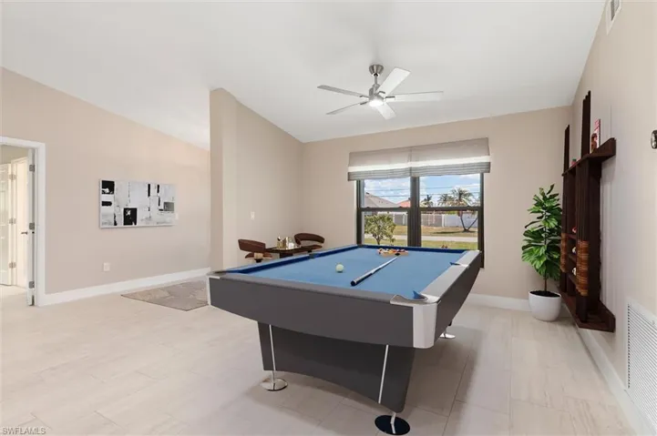 Virtually Staged Great Room featuring baseboards, light wood-style flooring, visible vents, and ceiling fan