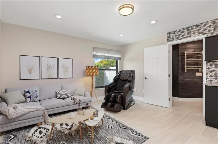 Virtually Staged Kitchenette room featuring baseboards, light wood finished floors, and recessed lighting