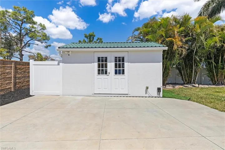 Garage with fence