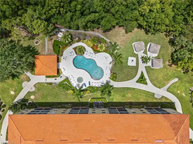 Resort style pool & chickee huts
