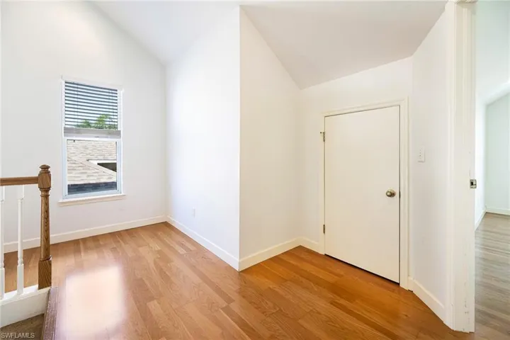 Second floor landing with large storage closet.