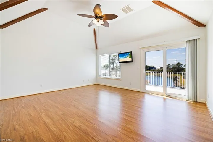 Master bedroom with private balcony.