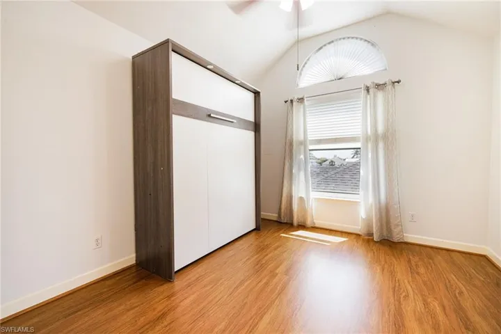 Third floor guest bedroom with vaulted ceilings
