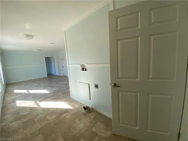 Laundry room with washer hookup and hookup for an electric dryer