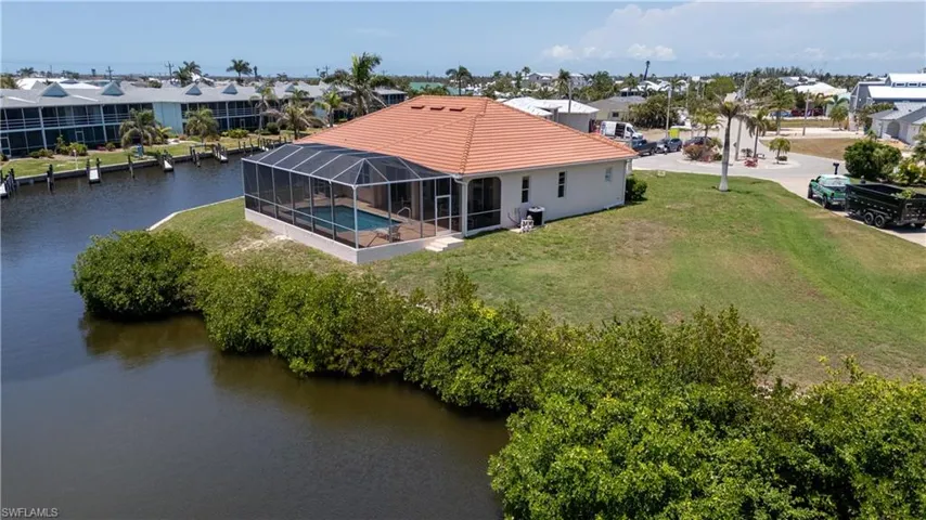 Aerial view of residential area with a nearby body of water