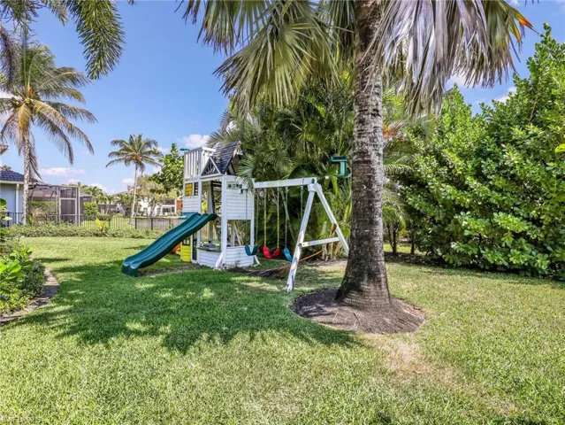 View of play area with a yard