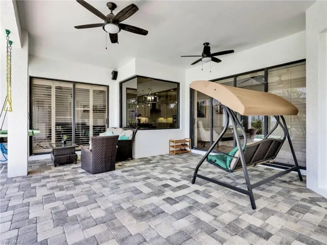 View of patio featuring a ceiling fan and an outdoor hangout area