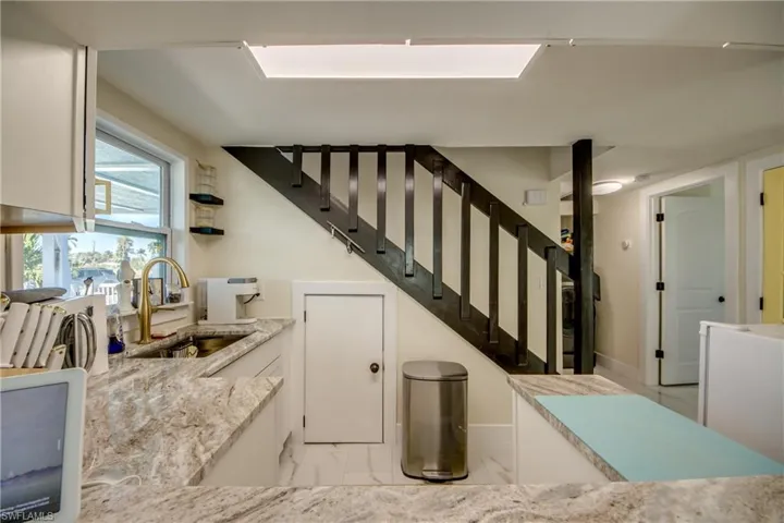 Stairs featuring marble look tiles