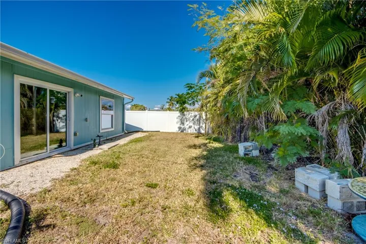 View of fenced backyard