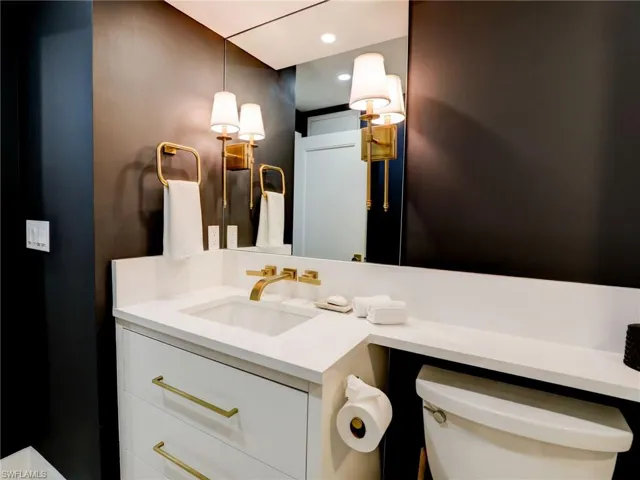 Bathroom with vanity and toilet