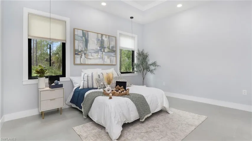 Bedroom featuring recessed lighting and ornamental molding