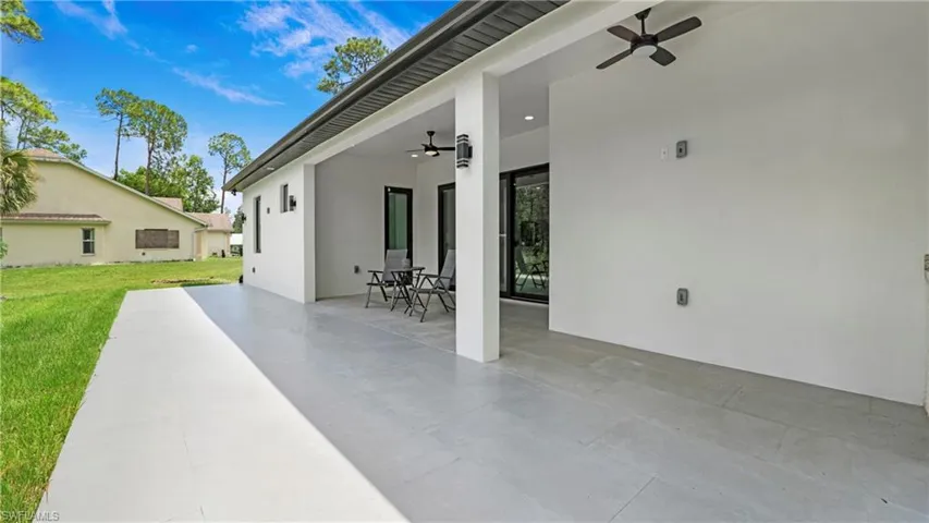 View of patio / terrace with a ceiling fan