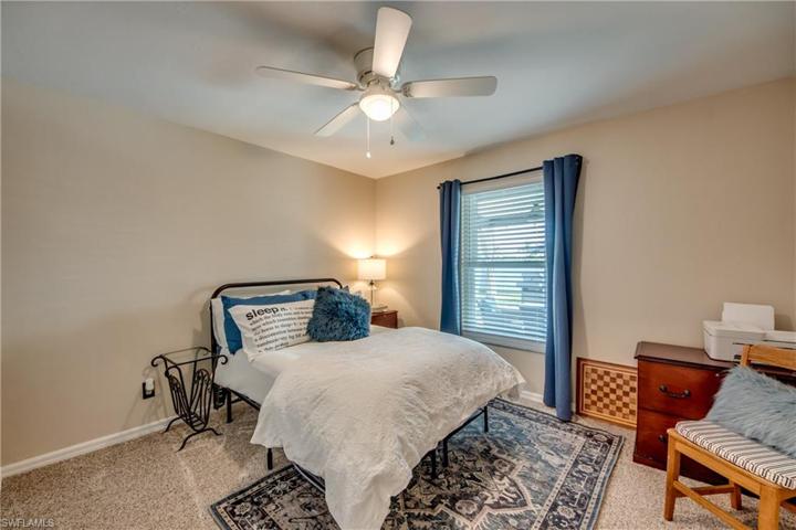 One of two guest bedrooms in a separate wing of the home.