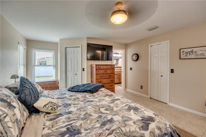 Master bedroom is split from the guest bedrooms and offers a nice size closet and more of that beautiful natural light!