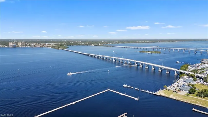 Bird's eye view of a notable bridge and a nearby body of water