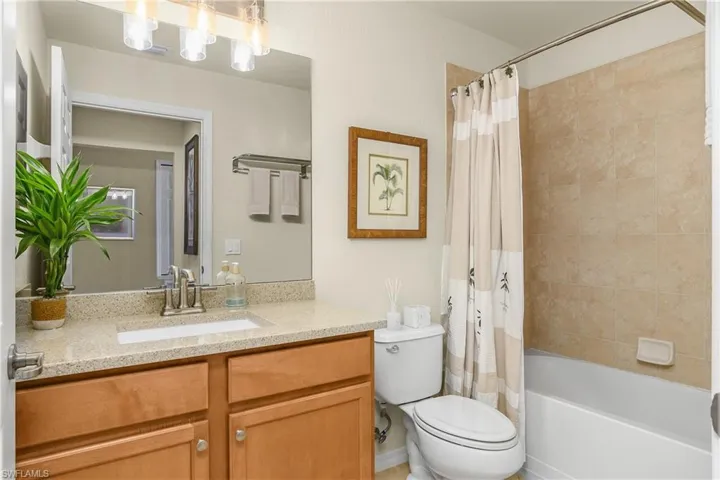 Second Full bathroom with vanity and shower / bath combo