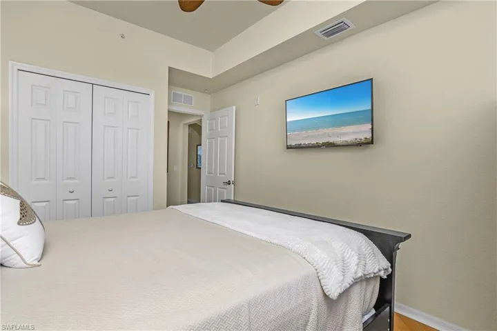 Second Bedroom with a ceiling fan and a closet