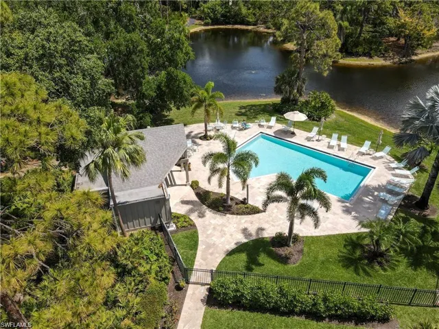 View of the walkway to Sand Pine II private pool/lake. There are several pools throughout Bay Forest.
