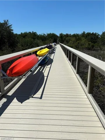 Kayak storage along the walkway.