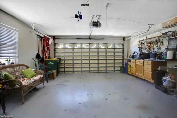 2 car attached garage with built in work bench.