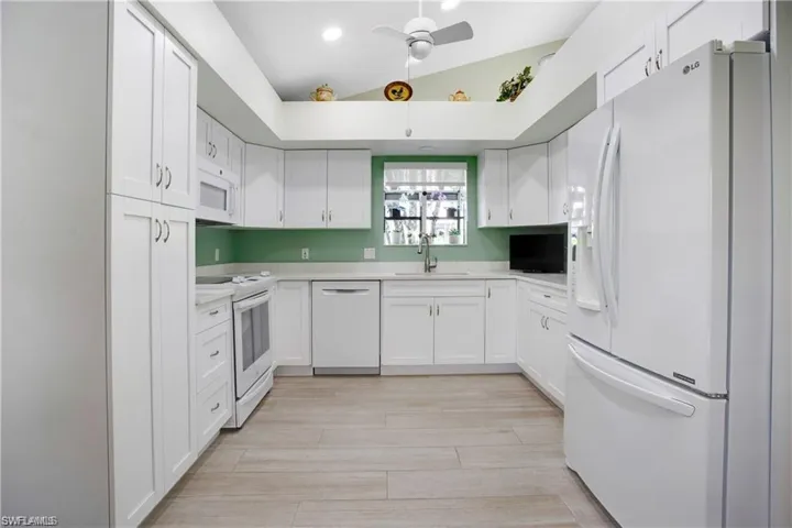 Quartz counters, wonderful window plant shelf, abundance of natural light.