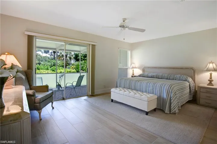 Primary bedroom #1 is located downstairs with sliders out to the lanai.
