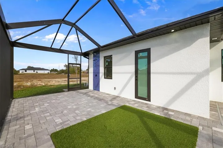 View of patio / terrace with a sunroom and a lanai
