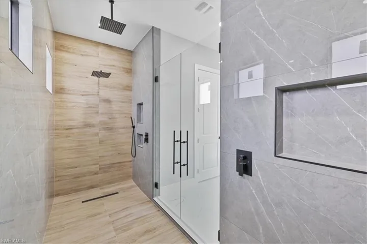 Bathroom featuring a shower stall