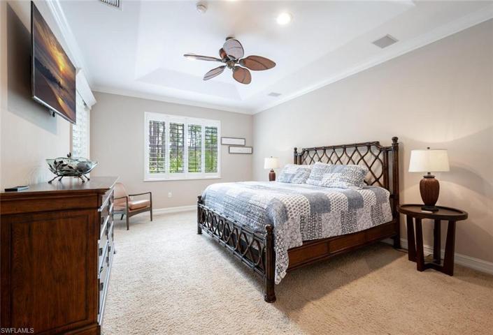 Spacious Owner's Bedroom. Walk-In Closet has Custom Built-Ins.