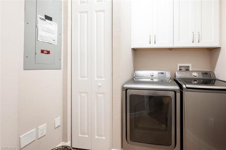 Laundry Room has a Barn Door, 42'' Soft Close Cabinets & Upgraded Washer & Natural Gas Dryer.