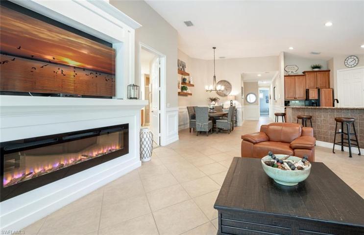 Living Room with Custom Built Floor To Ceiling Fireplace.